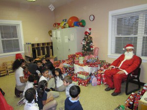 Santa Claus Makes a Stop at John L. Sullivan Apartments